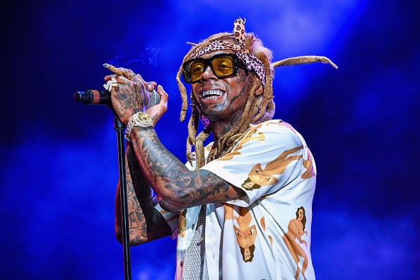 Lil Wayne performs during Lil WeezyAna at Champions Square on August 25