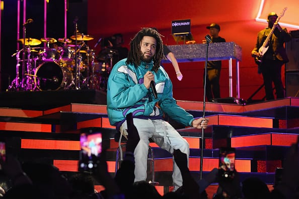 J. Cole performs at halftime during the 68th NBA All-Star Game at Spectrum Center on February 17