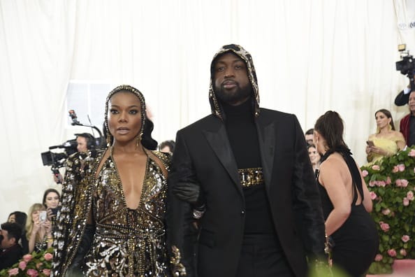 Gabrielle Union and Dwyane Wade arrive at the 2019 Met Gala Celebration Camp at The Metropolitan Museum of Art on May 06