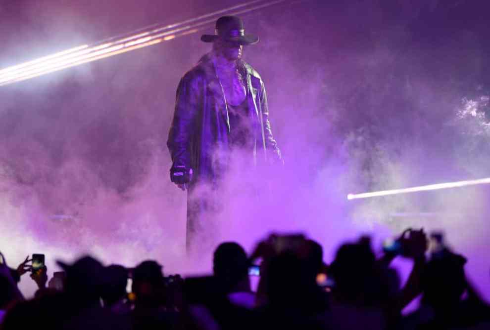 TOPSHOT - World Wrestling Entertainment star The Undertaker makes his way to the ring during a match at the World Wrestling Entertainment (WWE) Super Showdown event in the Saudi Red Sea port city of Jeddah late on January 7