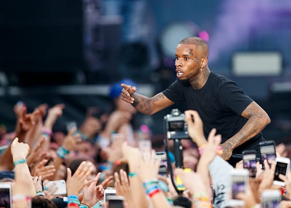 Singer Tory Lanez goes into the crowd as he performs during Day 2 of FVDED in The Park at Holland Park on July 06