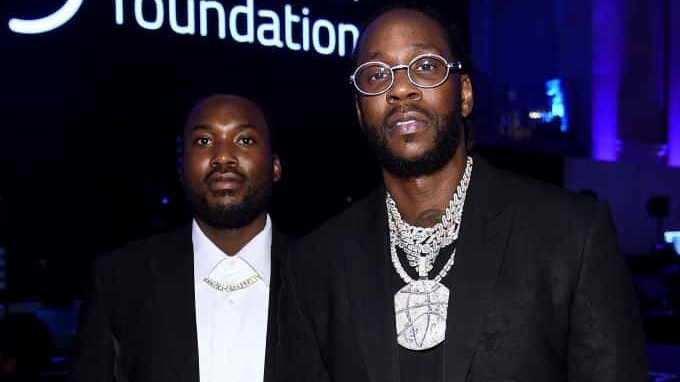 Meek Mill and 2 Chainz standing next to each other looking at the camera