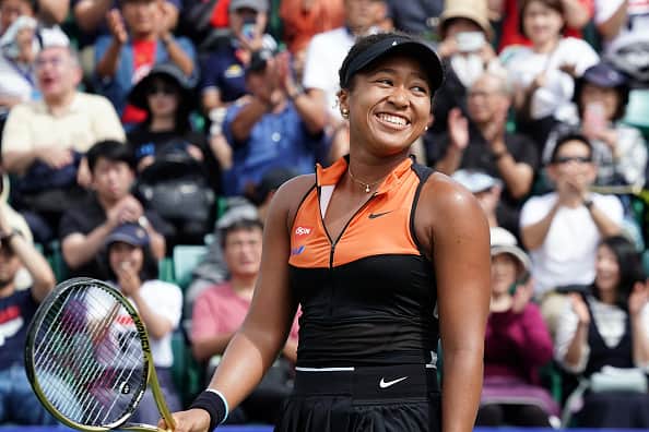 Singles champion Naomi Osaka of Japan celebrates after winnings the Singles final against Anastasia Pavlyuchenkova of Russia during day seven of the Toray Pan Pacific Open at Utsubo Tennis Cent on September 22