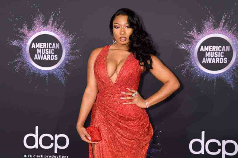 Megan Thee Stallion wearing a red dress