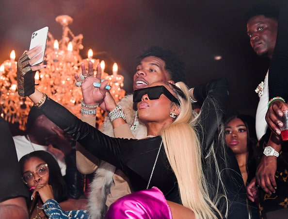 Rapper Lil Baby and Jayda Cheaves attend the Official Fight After Party at Compound on December 29