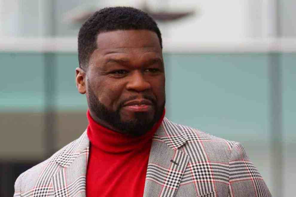 50 Cent wearing red turtle neck