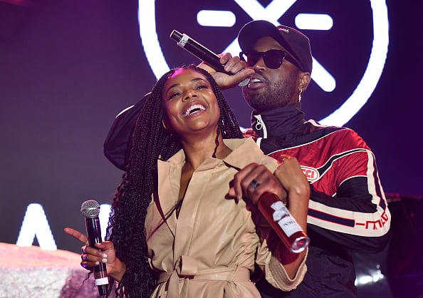 Dwyane Wade and Gabrielle Union perform onstage at ONE37pm x Dwyane Wade's Masters of the Mic Karaoke at Night Two of BUDX Miami by Budweiser on February 01