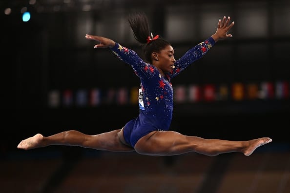 TOPSHOT - USA's Simone Biles competes in the artistic gymnastics balance beam event of the women's qualification during the Tokyo 2020 Olympic Games at the Ariake Gymnastics Centre in Tokyo on July 25