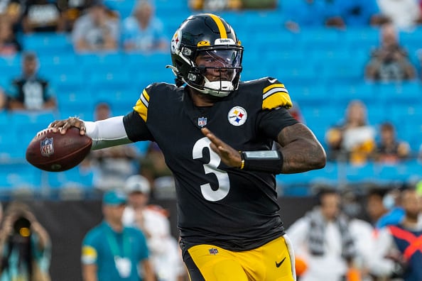 Dwayne Haskins #3 of the Pittsburgh Steelers looks to pass against the Carolina Panthers during the first half of an NFL preseason game at Bank of America Stadium on August 27