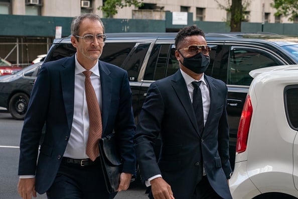Actor Cuba Gooding Jr. (R) arrives at Criminal Court to set a trial date on October 18
