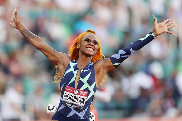 Sha'Carri Richardson celebrates winning the Women's 100 Meter final on day 2 of the 2020 U.S. Olympic Track & Field Team Trials at Hayward Field on June 19