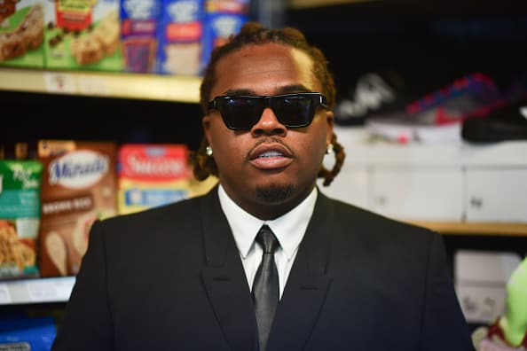 Gunna visits his old middle school to host a giveaway at Ronald E. McNair Middle School on September 16