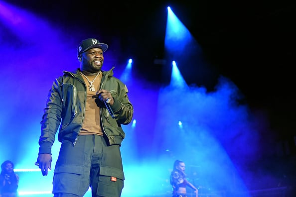 50 Cent performs onstage during the BMF world premiere screening and concert at Cellairis Amphitheatre at Lakewood on September 23
