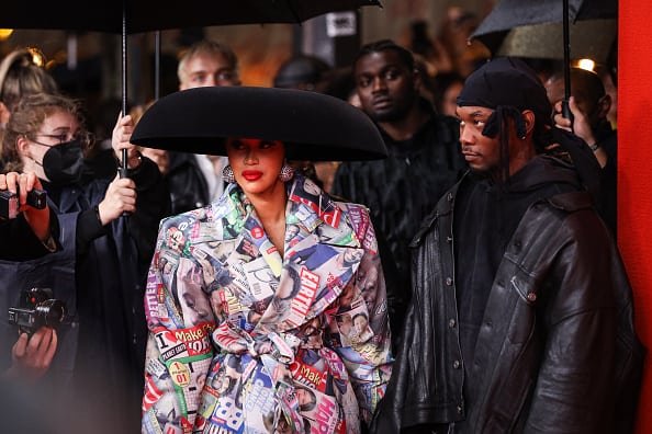 For Non-Editorial use please seek approval from Fashion House) (L-R) Cardi B and rapper Offset attend the Balenciaga Womenswear Spring/Summer 2022 show as part of Paris Fashion Week at Theatre Du Chatelet on October 02