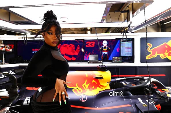 Megan Thee Stallion poses for a photo in the Red Bull Racing garage before the F1 Grand Prix of USA at Circuit of The Americas on October 24