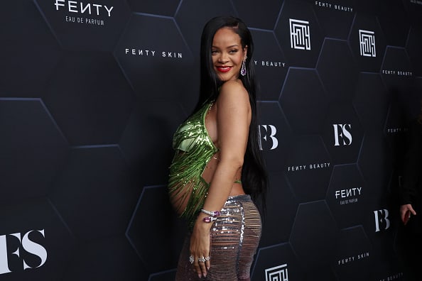 Rihanna poses for a picture as she celebrates her beauty brands fenty beauty and fenty skin at Goya Studios on February 11
