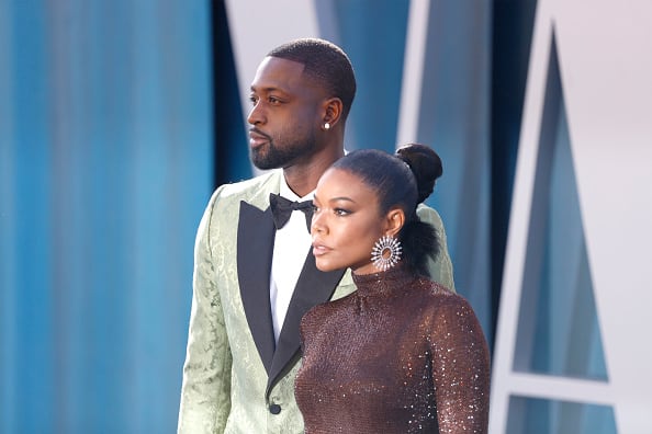Dwyane Wade and Gabrielle Union attend the 2022 Vanity Fair Oscar Party Dinner Arrivals at Wallis Annenberg Center for the Performing Arts on March 27