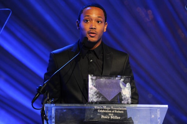Romeo Miller presents his father rapper/producer Percy Miller an award during a Celebration of All Fathers' Gala Dinner with Andrea Bocelli at Paramount Studios on June 6