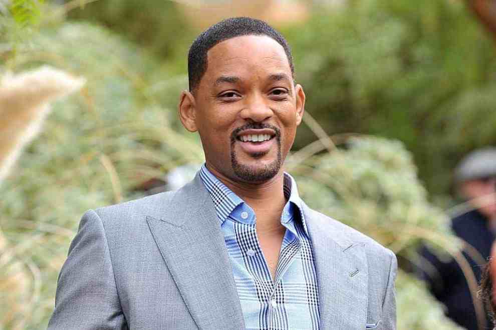 Will Smith smiling at the camera