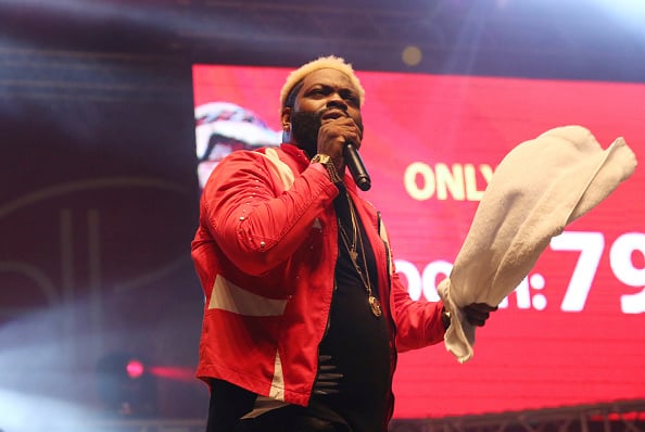 Jamaican recording artist Demarco performs during the One Love Reggae Concert in the Festival Village as part of the 47th annual Carnival in St Maarten on April 28
