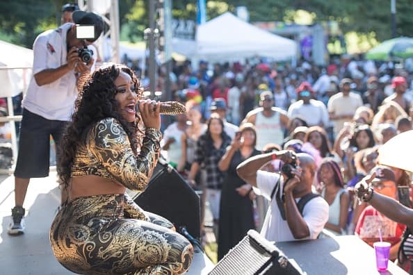 Singer Jhonni Blaze performs on stage during the 2016 Pure Heat Community Festival at Piedmont Park on September 4