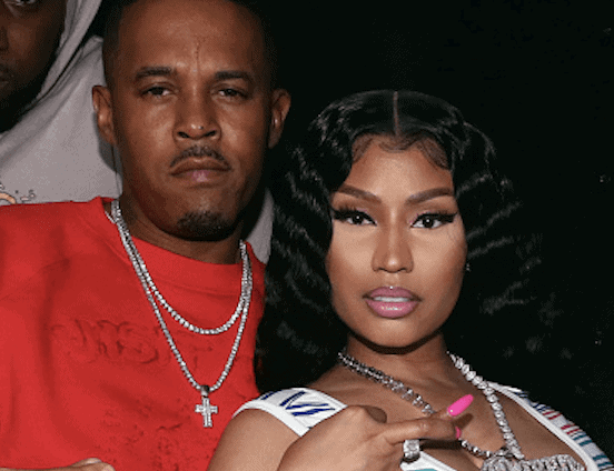 Kenneth Zoo Petty (L) and Nicki Minaj attend Church On Sundays Hosted By Nicki Minaj And Phil The Mayor And DJ Clues Birthday Party at The Argyle on February 8