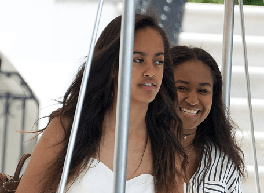 Malia and Sasha Obama depart ahead of their parents United States President Barack Obama and first lady Michelle Obama depart the White House August 6