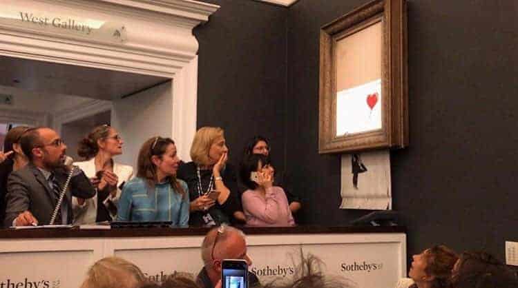 Banksy Girl With Balloon painting after self destructing at Southeby's Auction