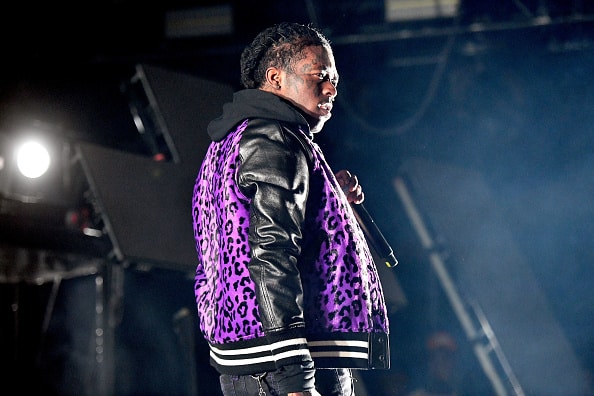 Rapper Lil Uzi Vert performs onstage during the 'Endless Summer Tour' at Five Point Amphitheater on July 31