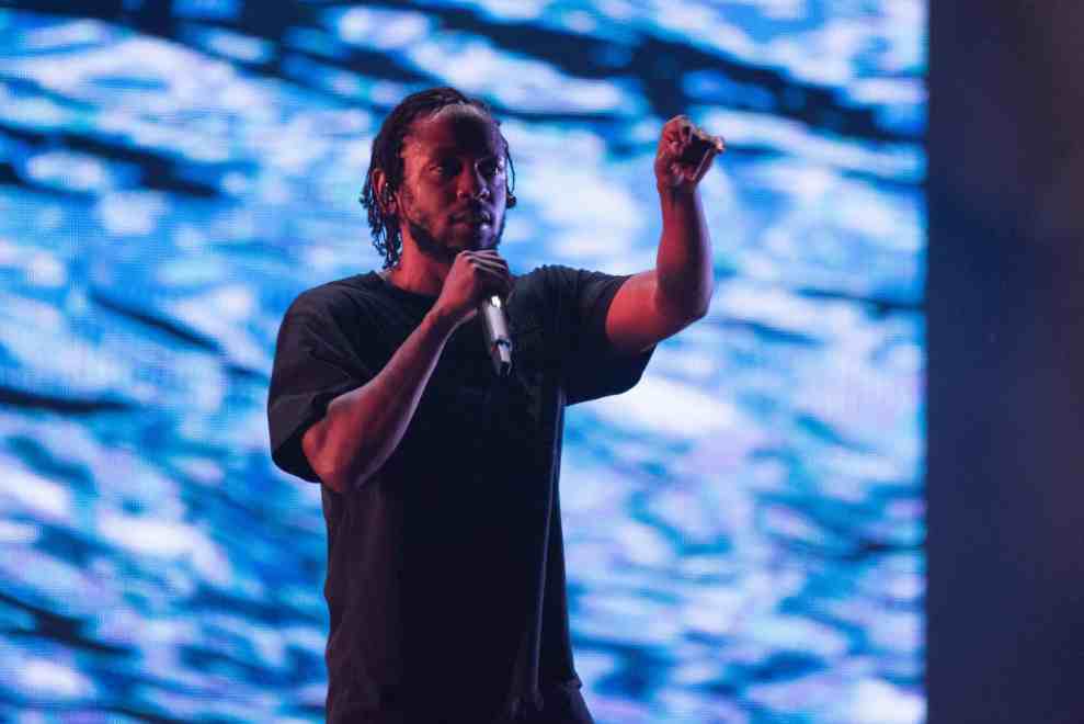 Kendrick Lamar performing on stage