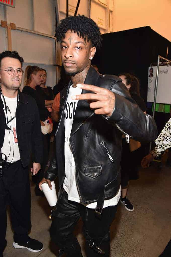 21 Savage poses backstage for the Jeremy Scott show during New York Fashion Week: The Shows at Gallery I at Spring Studios on Se