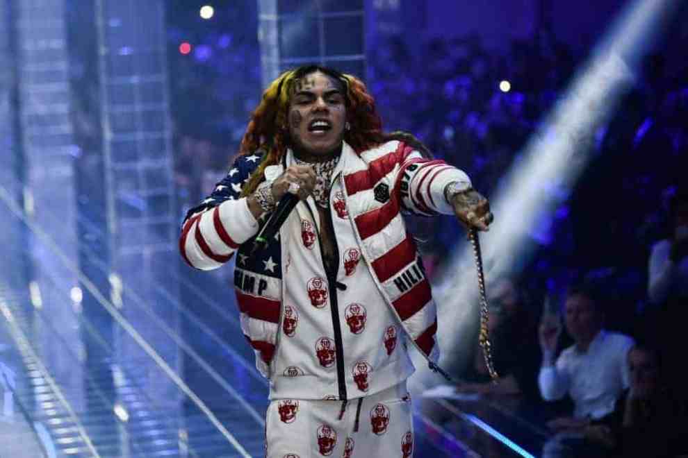 6ix9ine wearing red