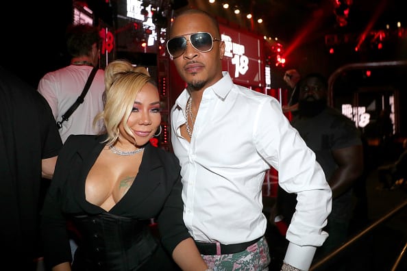 Tiny and T.I. are seen backstage during the BET Hip Hop Awards 2018 at Fillmore Miami Beach on October 6
