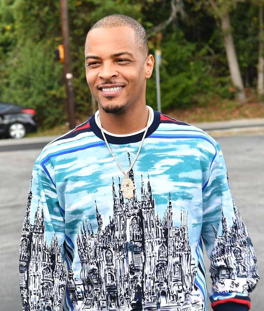 T.I. wearing a blue and white sweater