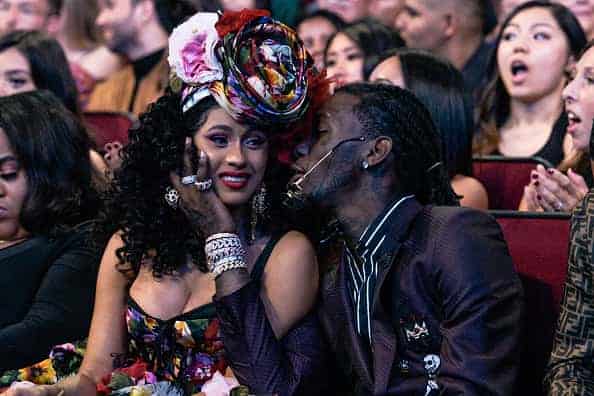 cardi b and offset in the audience at the 2018 AMA's