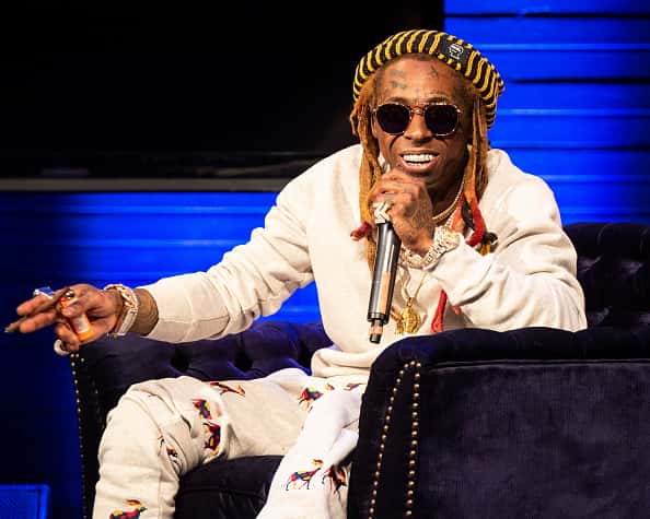 Lil Wayne in chair giving interview