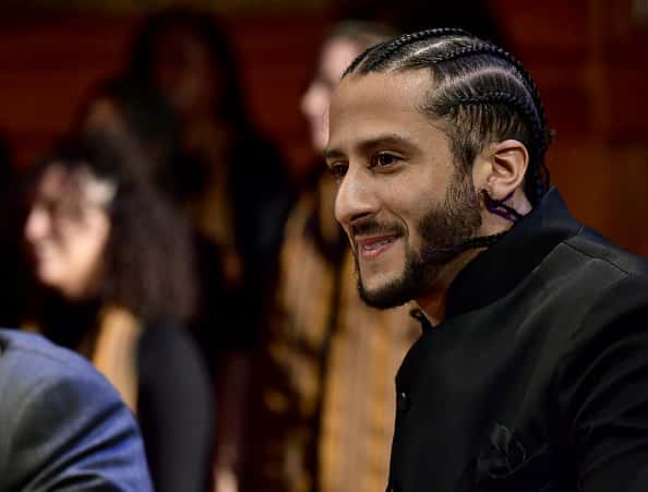 Colin Kaepernick on stage at the W.E.B. Du Bois Medal Award Ceremony at Harvard University on October 11