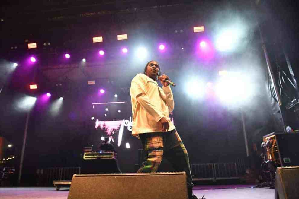 Pusha T performs on stage