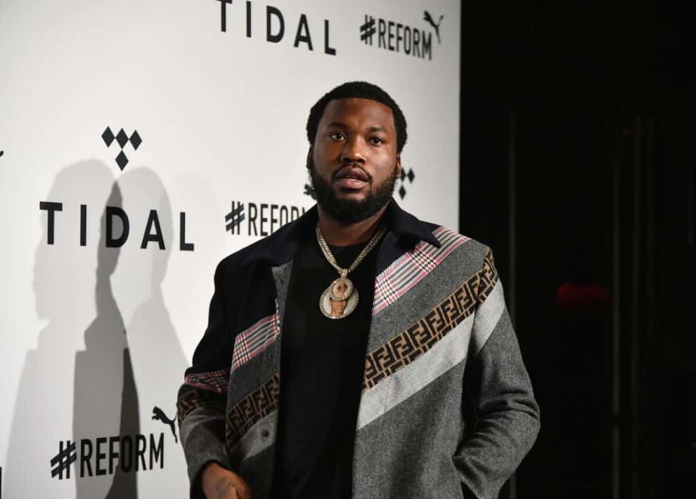 Meek Mill wearing black and grey at TIDAL event