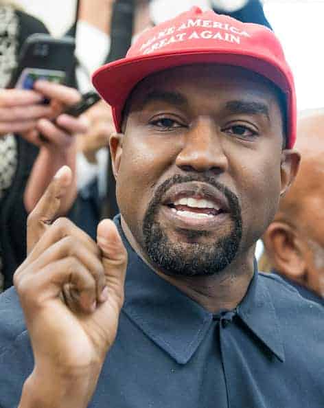 Kanye West wearing MAGA hat