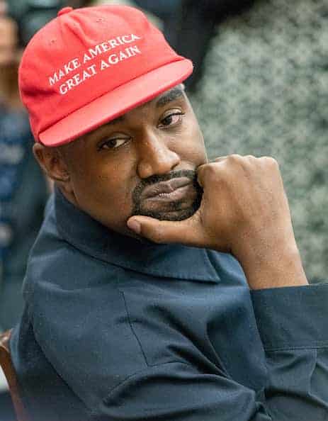 Kanye West wearing MAGA hat