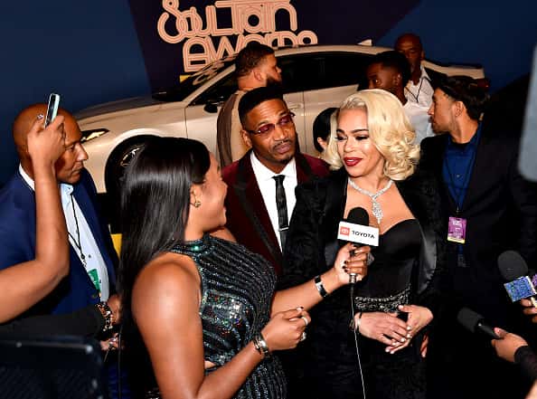 Stevie J (L) and his wife Faith Evans attend the 2018 Soul Train Awards