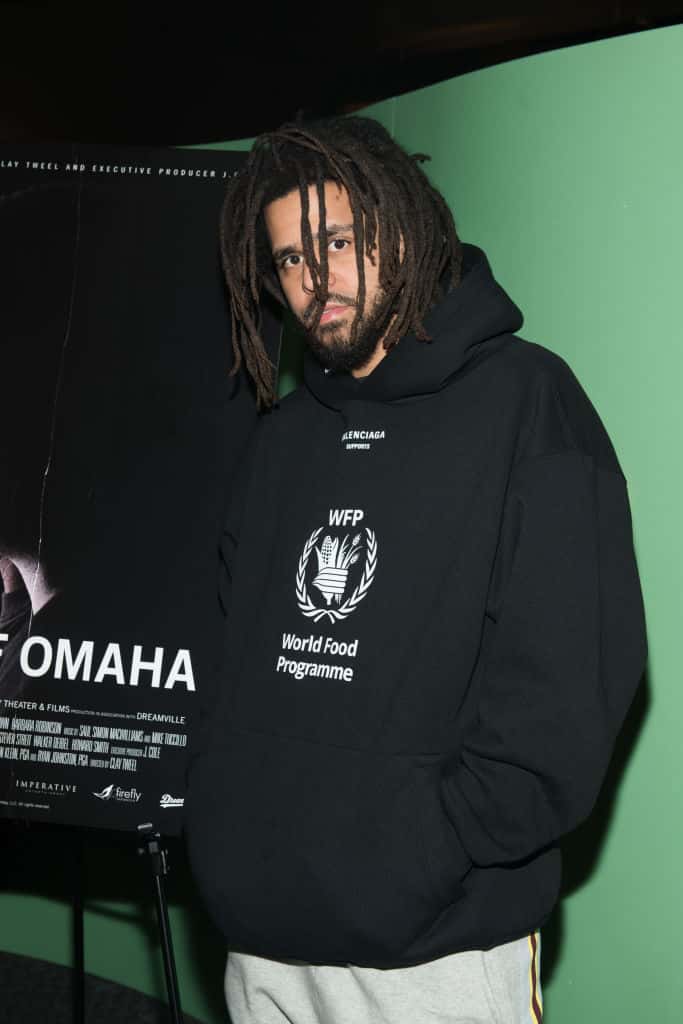 J.Cole wearing a black hoodie