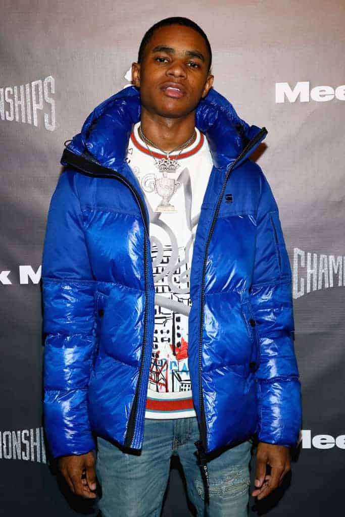 YBN Almighty Jay wearing a blue jacket looking at the camera