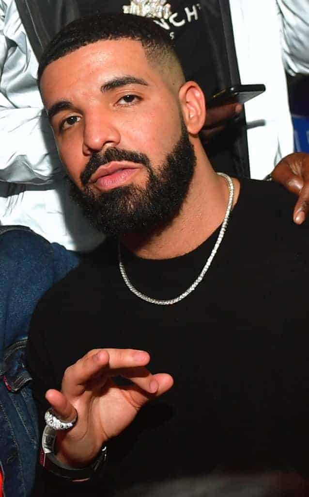 Drake wearing a black shirt facing the camera