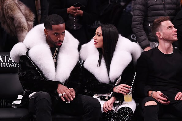 Safaree Samuels and Erica Mena attend the game between the Utah Jazz and the Brooklyn Nets at Barclays Center on November 28