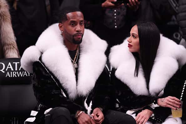 Safaree Samuels and Erica Mena attend the game between the Utah Jazz and the Brooklyn Nets at Barclays Center on November 28