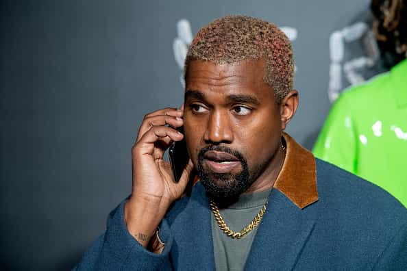 Kanye West on red carpet.