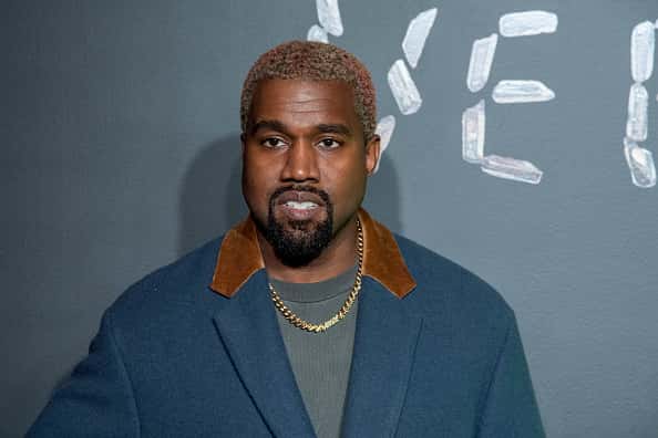Kanye West on red carpet.