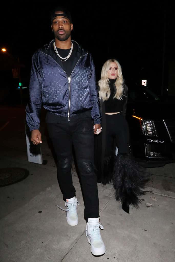 Tristan Thompson and Khloe Kardashian at a party.